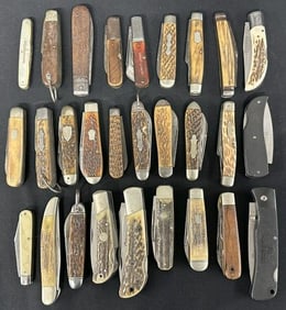 (28) vintage and not so vintage pocket knives, ( I saw one with a broken small blade ), just as we