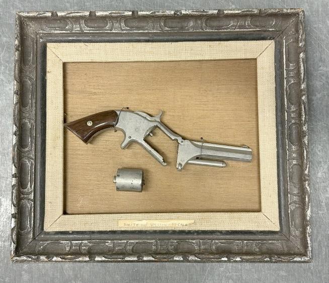 SMITH & WESSON 32 Caliber pistol displayed on board in frame, just as we found it, Serial Number is: SMITH & WESSON 32 Caliber pistol displayed on board in frame, just as we found it, Serial Number is 12685. From estate of Civil War enthusiast. ( can ship off the frame ). New York State buyers must g