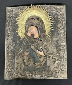 Russian icon with possibly decorative silver (?) clad front, nice overall condition, measures 12.5"