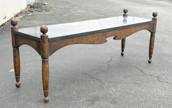 Unusual form older black slate top coffee table, wonderful form and patina, structurally sound, from: Unusual form older black slate top coffee table, wonderful form and patina, structurally sound, from nice Dutchess County home, measures 48" wide x 14.25" deep x 16" high.