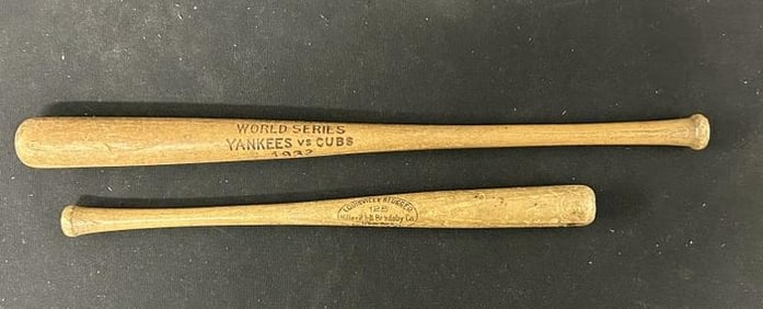 (2) old children's souvenir bats including a WORLD SERIES 1932 YANKEES vs. CUBS and the other a