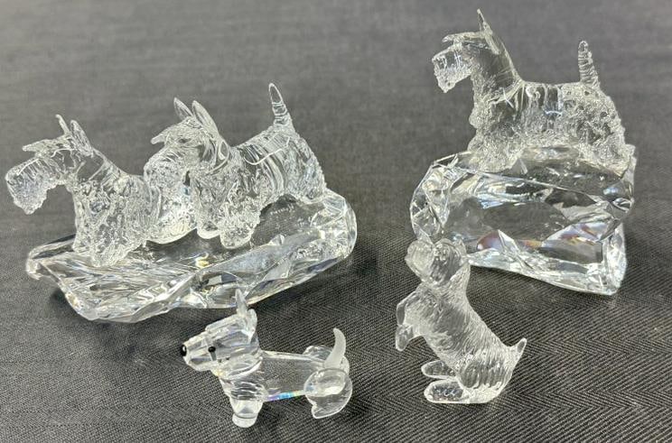 (4) Scottish Terrier glass figurines, ( 1) SWAROVSKI, (1) WATERFORD, and (2) large figures are by: (4) Scottish Terrier glass figurines, ( 1) SWAROVSKI, (1) WATERFORD, and (2) large figures are by same Artist, signed illegibly ( looks like Ned Harns (?)...all in fine condition, to show scale the la