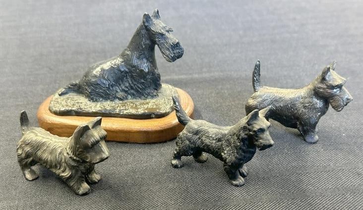 (4) pc. Scottish Terrier metal & bronze figures, the large bronze dog on base is signed EAGLE and: (4) pc. Scottish Terrier metal & bronze figures, the large bronze dog on base is signed EAGLE and dated 1980, it measures 4" long ( the actual bronze ), to show scale. The other (3) are bronze and (1)