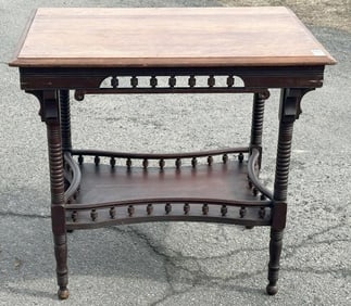 Circa 1910 stand with spindles aprons, structurally sound, some light blemishes on top, measures 31"