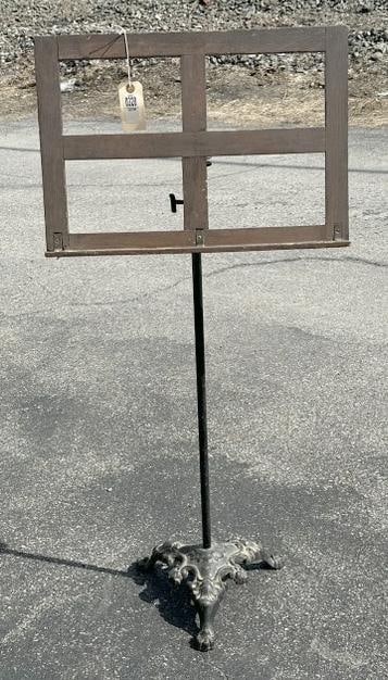 Nice older adjustable music stand, cast iron base, with oak top, nice overall condition. As you see: Nice older adjustable music stand, cast iron base, with oak top, nice overall condition. As you see it , it measures 43" high and holder is 20" across.