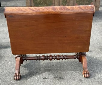 Wonderful flamed mahogany diminutive dropleaf table with claw feet, folds up to a narrow