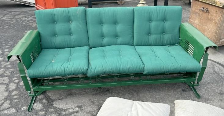 Circa 1940's metal glider in very nice condition, with (2) sets of cushions, measures 76" wide x 32": Circa 1940's metal glider in very nice condition, with (2) sets of cushions, measures 76" wide x 32" deep x 26.5" high. Nice green paint…structurally sound. From nice Dutchess County estate.
