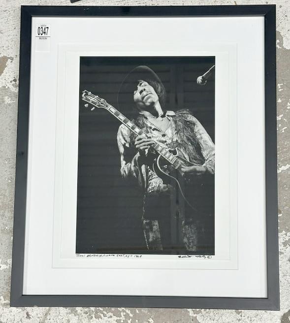 Elliot Landy signed photograph of Jimi Hendrix 1968, at Fillmore East, New York City. From: Elliot Landy signed photograph of Jimi Hendrix 1968, at Fillmore East, New York City. From Woodstock, N.Y. estate, in fine condition, titled lower left, signed by Elliot Landy lower right. The photogr