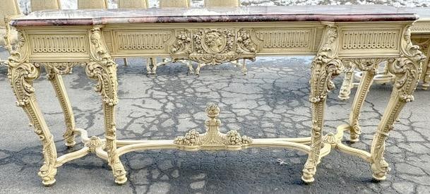 Fabulous circa 1910 heavily carved marble top sideboard, with pullout drawer for flatware.