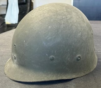 WW II era helmet, lightweight material, just as we found it in local estate basement.