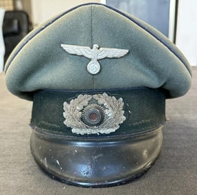 WW II German Military visor cap, just as we found it on local estate basement with other helmets.