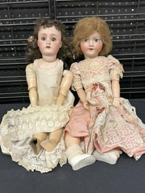 (2) antique larger bisque head dolls in as found condition in local estate ( the heads are ok, one