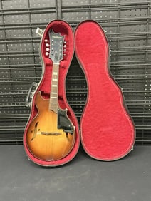 HARMONY "Batwing" 1960's or 70's mandolin, with case, original estate condition with small split on