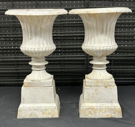 Pair small cast iron garden urns, not antique, nice older crusty white paint, come in (2) parts,: Pair small cast iron garden urns, not antique, nice older crusty white paint, come in (2) parts, they measure 20" high. From local estate in Hudson Valley.