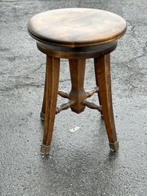 Nice older revolving seat stool, nice condition, measures 19" high x 14.5" across the top.