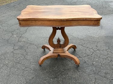 Period Empire mahogany table, structurally sound, has sun fading to finish, just as we found it in
