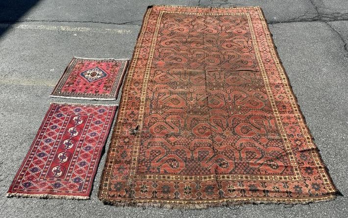 (3) handmade estate oriental rugs, the larger has a few holes, some wear, but was used till now, and: (3) handmade estate oriental rugs, the larger has a few holes, some wear, but was used till now, and (2) small scatter rugs in nice condition. They measure 117" x 64", 35" x 22.5" and 24" x 24".