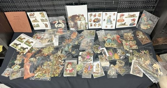 Thousands of Victorian die cuts & lithos, she separated them all and put in sleeves....just as we