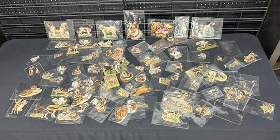 Hundreds of Victorian DOG & CAT die cuts, most all she had separated in sleeves…..nice overall