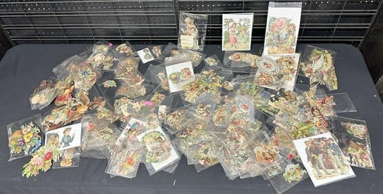 Hundreds & Hundreds of Victorian die cuts, she had them all separated and in sleeves.....a lot