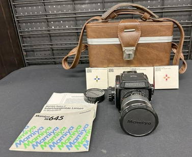 Mamiya 645 Medium Format Camera, with 45 mm lens, nice and clean, very clean, appears to have had: Mamiya 645 Medium Format Camera, with 45 mm lens, nice and clean, very clean, appears to have had little use, with case and some filters as pictured...from fine estate in Hudson Valley…..Serial Numb