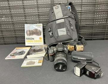 Nikon D800 camera with AF S NIKKOR 28-300 mm 1:35 - 5.6 G lens, in back pack case, with batteries,