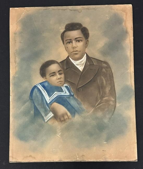 African American hand embellished photograph of Father & Child, crease rip top left corner, measures: African American hand embellished photograph of Father & Child, crease rip top left corner, measures 20" x 16", some light water stains on top & bottom edges….