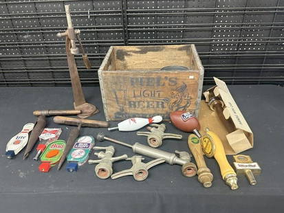Older PIEL'S LIGHT BEER wood crate filled with BEER accessories, bottle capper, keg items, taps,: Older PIEL'S LIGHT BEER wood crate filled with BEER accessories, bottle capper, keg items, taps, etc. Just as we found it, good lot for a dealer to sort out….