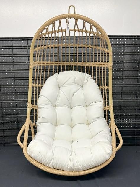 Hanging rattan porch chair, nice condition, with white cushion, measures 45" high x 28" across. ( (1 of 2)