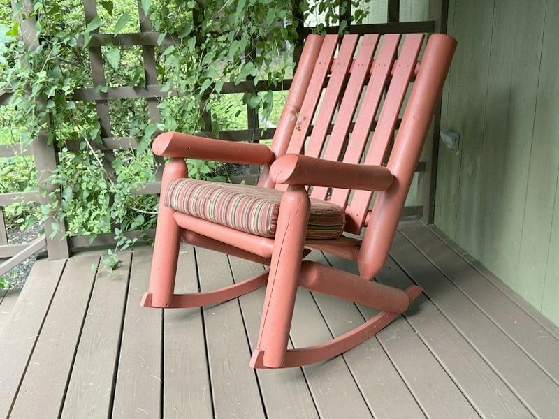 Adirondack style porch rocking chair, structurally sound, measures 39.5" high x 25.5" wide x 32" (1 of 2)