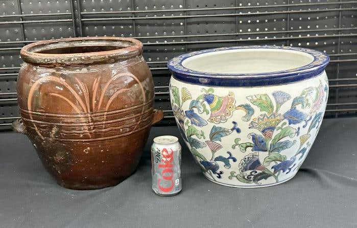 (2) jardinaires from local Korean family estate, one is terra cotta with glaze and other is a: (2) jardinaires from local Korean family estate, one is terra cotta with glaze and other is a contemporary jardinaire….I am not sure of the origin of the terra cotta one, they measure 10" & 13.5" hi