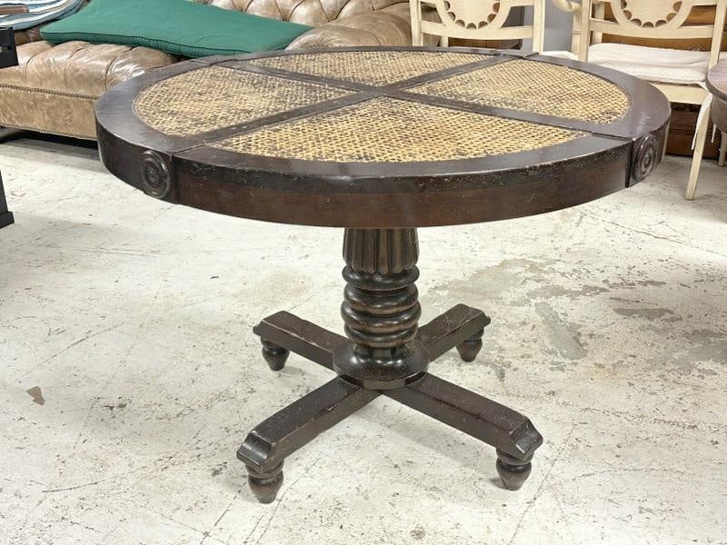 Decorative round table with cane top, nicely turned base, and structurally sound. Possibly had a (1 of 4)