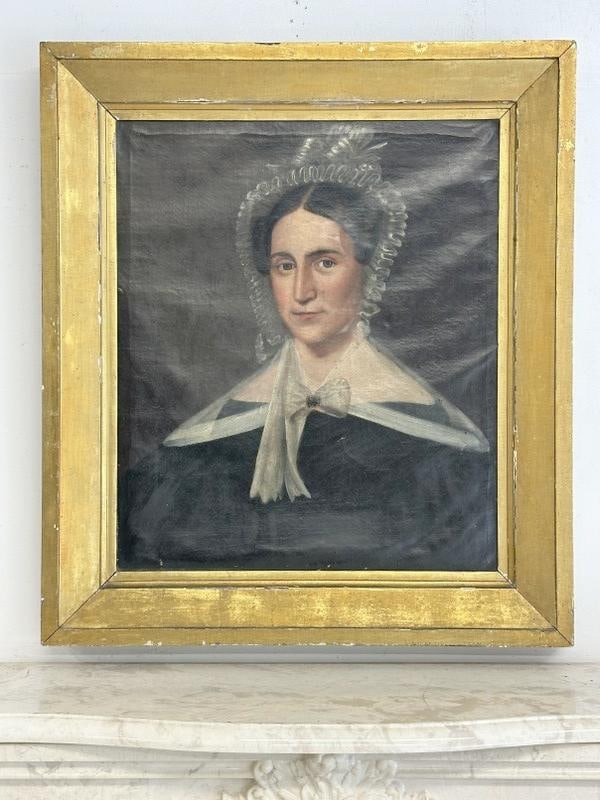 Early 19th c portrait of a Woman with bonnet, in nice period gilt frame, comes from Hudson Valley: Early 19th c portrait of a Woman with bonnet, in nice period gilt frame, comes from Hudson Valley farmhouse, some od patches on back, just as we found it. The painting measures 26" x 22", the frame me