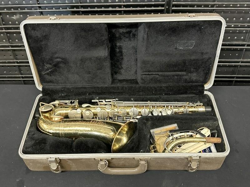 Buescher Aristocrat Alto Saxophone, has some wear to finish, just as we found it, in case. Serial (1 of 9)