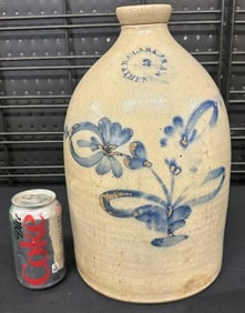 N. CLARK JR. ATHENS N.Y. decorated stoneware jug with flowers, ( some wear to some of the blue ),