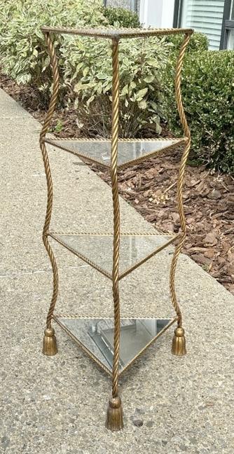 Decorative ( Italian ) gold twist leg tiered stand with tassels feet. Has mirror bottom shelf and (1 of 4)
