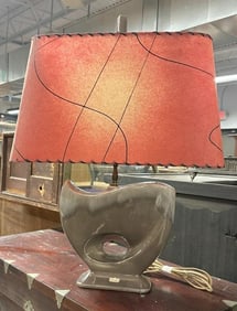 ROYAL HAEGAR Mid Century art pottery lamp with original red parchment shade and finial, from local