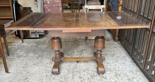 Circa 1920's oak dining table ( was a refractory table with pull out leaves that do not work ), so