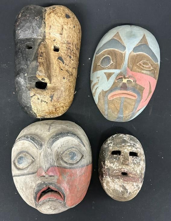 African masks (?) - ( origins unknown to us ), to show scale the largest mask is 12" high. Nice as: African masks (?) - ( origins unknown to us ), to show scale the largest mask is 12" high. Nice as found condition.