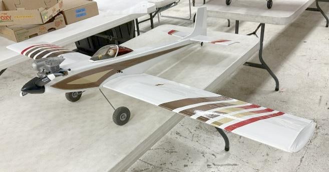 Large radio controlled airplane model with engine ( and eyeball in cock pit ), measures 43" long x (1 of 4)