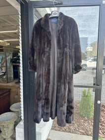Full length mink coat with ( NORHTERN LIGHTS BLOOMINGDALES ) label intact, from fine Woodstock, N.Y.