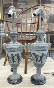 Pair wonderful decorative bronze table lamps with putti around the base and ram;s heads on sides,