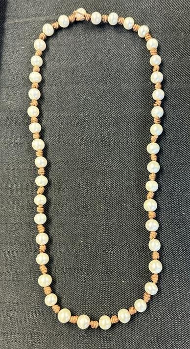 Fresh water pearl necklace with leather knots in between each pearl, nice overall condition,: Fresh water pearl necklace with leather knots in between each pearl, nice overall condition, measures approx. 26" long…..