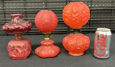 (3) miniature red glass oil lamps ( no chimneys ), from local estate collection, ( middle one