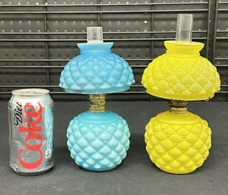 (2) miniature oil lamps, one blue satin glass and other is yellow cased glass……from local estate