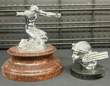 (2) re-issued (?) automobile hood ornaments, just as we found them, in very nice estate condition.