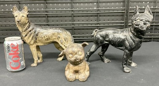 (3) old cast iron dog doorstops, with the German Shepherd retaining original paint, to show scale