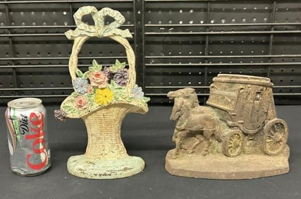 (2) old cast iron doorstops from local estate, the flower in a basket retains original paint, just