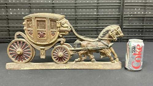 20" long iron horse drawn wagon lamp or was used as a doorstop. No damage to iron….just as we