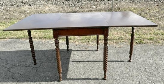 Wonderful circa 1900 or so mahogany long leaf drop swing leg dining table, nice old finish,